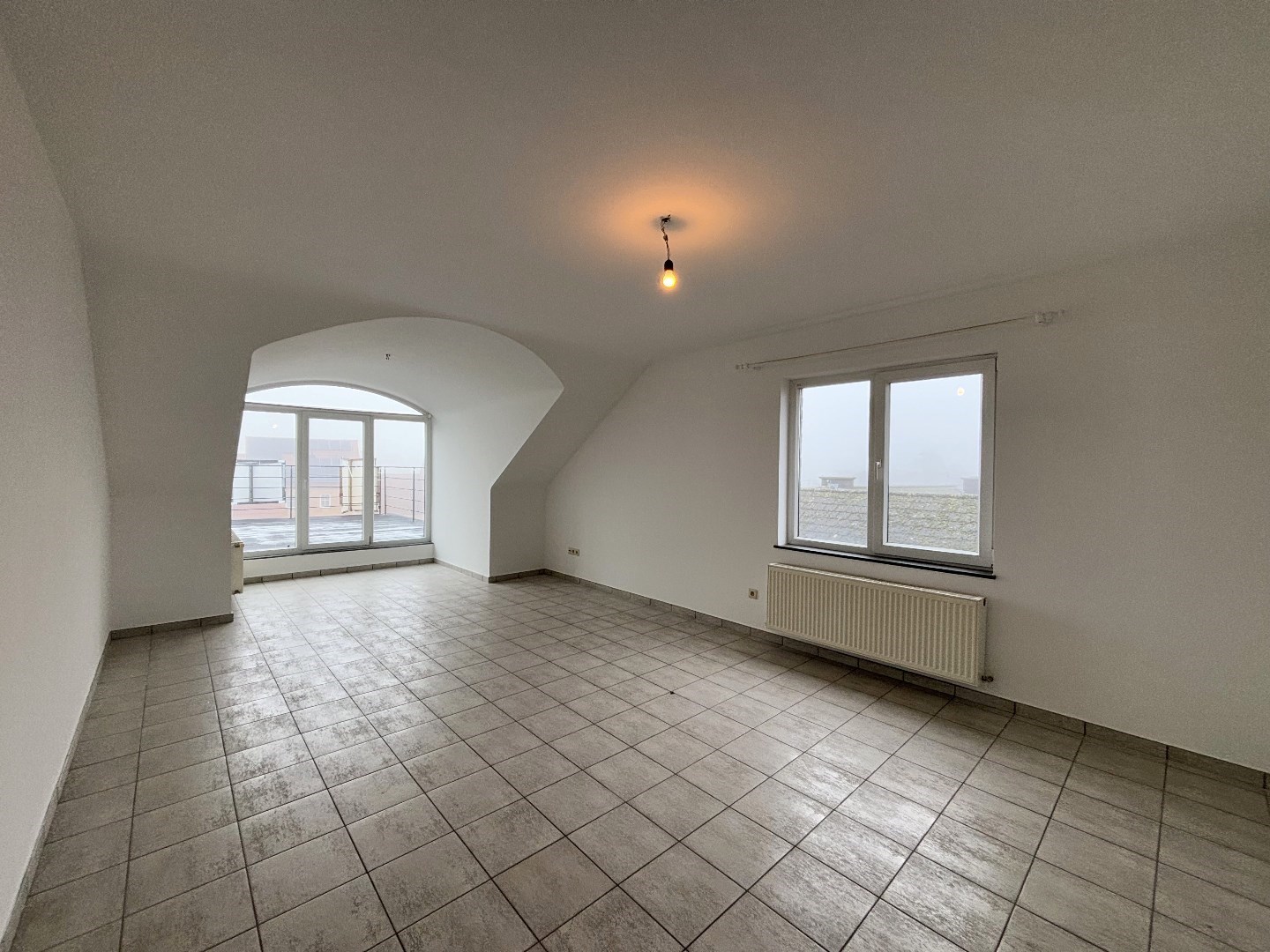 Instapklaar dakappartement met 2slpk. en ruim terras te Laakdal 