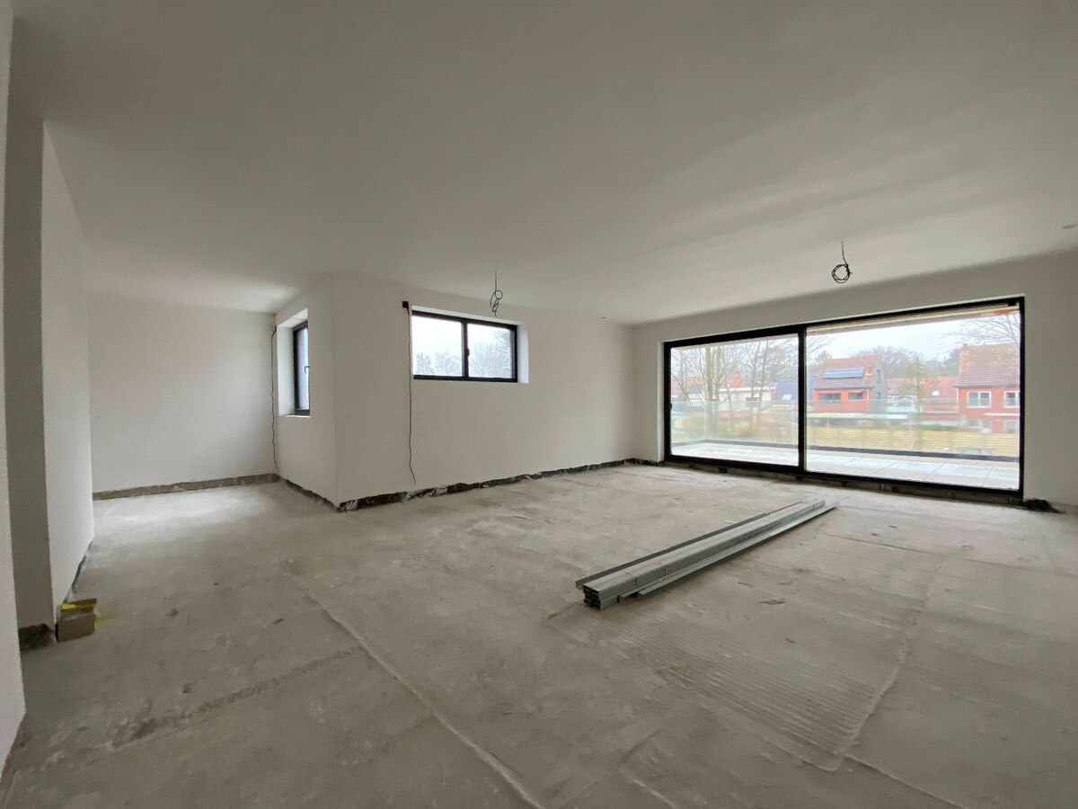 Luxueus nieuwbouw villa-appartement  van 168 m&#178; met 3 slaapkamers + ondergrondse garage en kelder in kleine residentie 