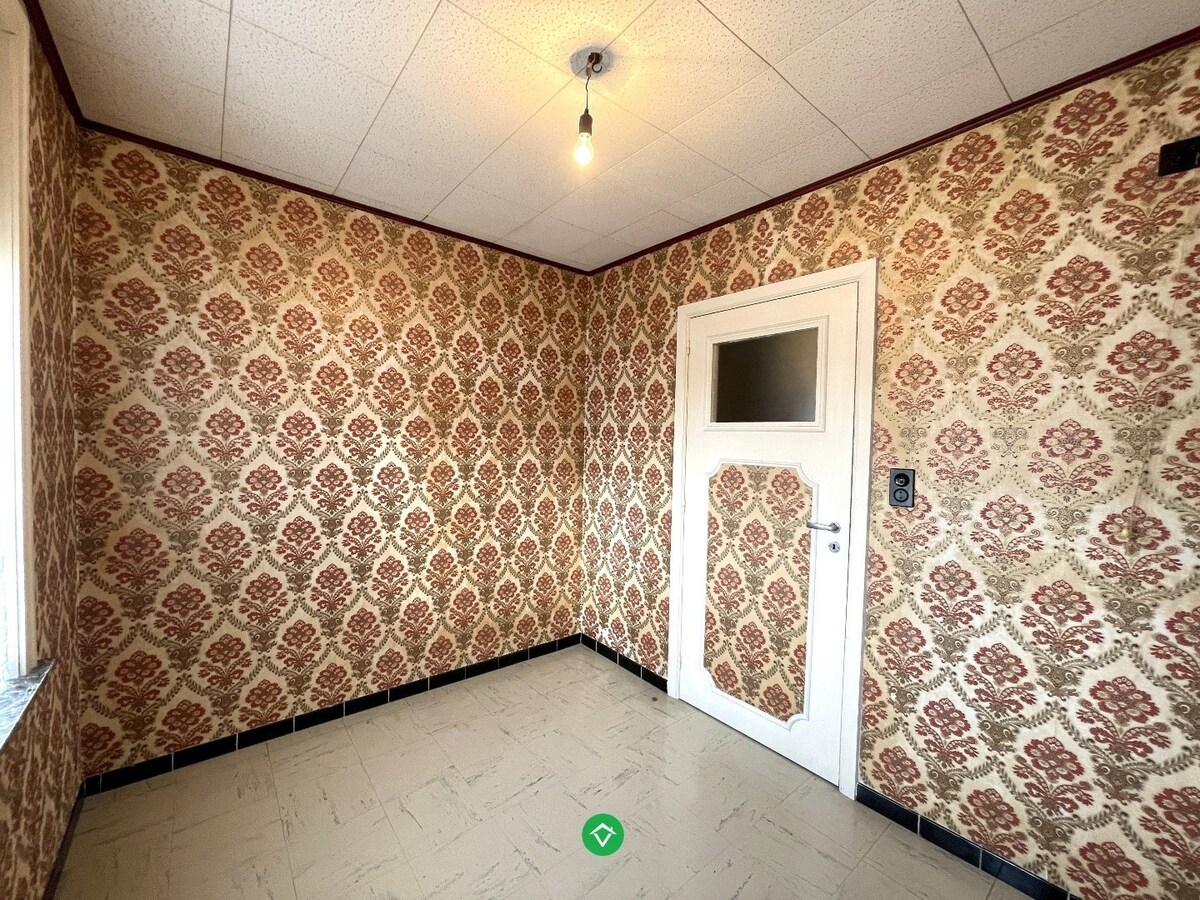 Stevige rijwoning met 3 slaapkamers met tuin en garage te Rumbeke 