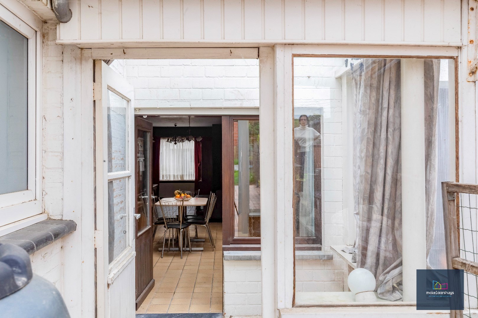 Rijwoning met tuin te Wetteren. 