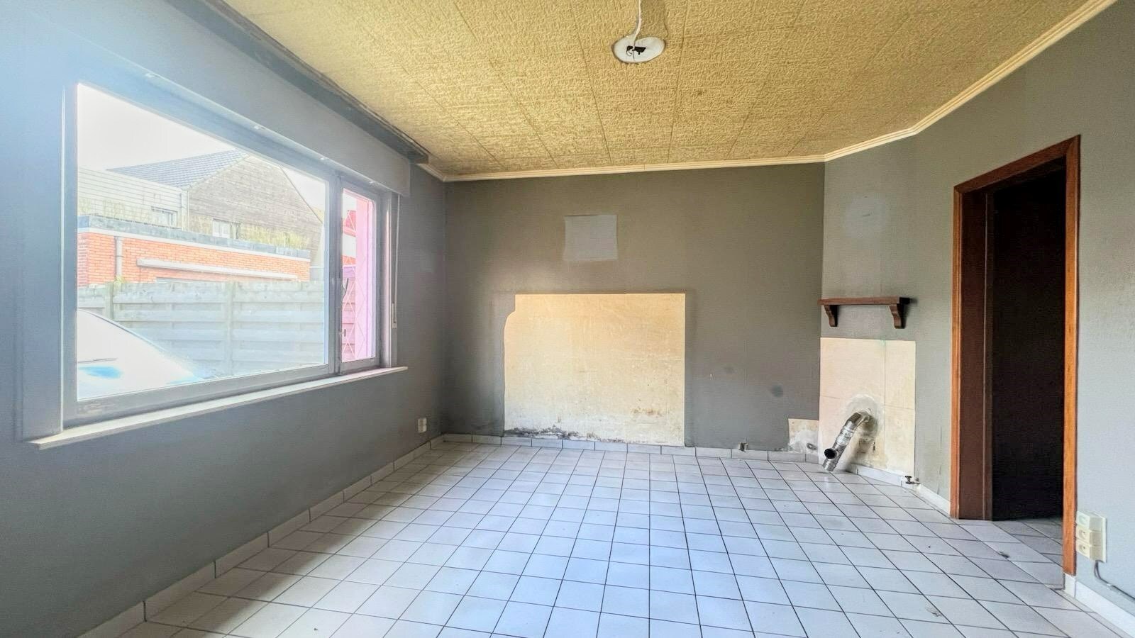 Betaalbare renovatiewoning in het gezellige Uikhoven 