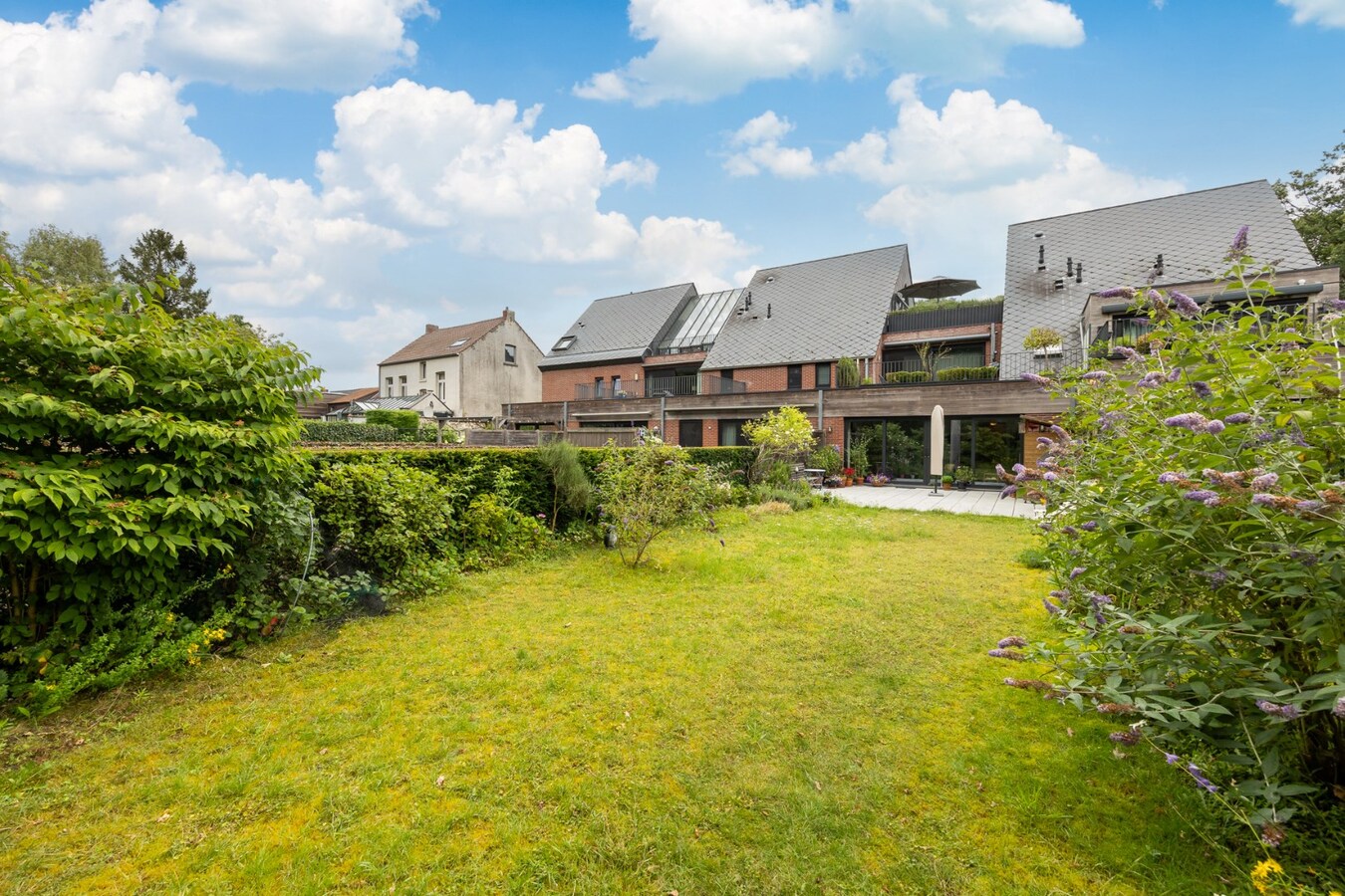 Gelijkvloers appartement met 2 slaapkamers en tuin op toplocatie 