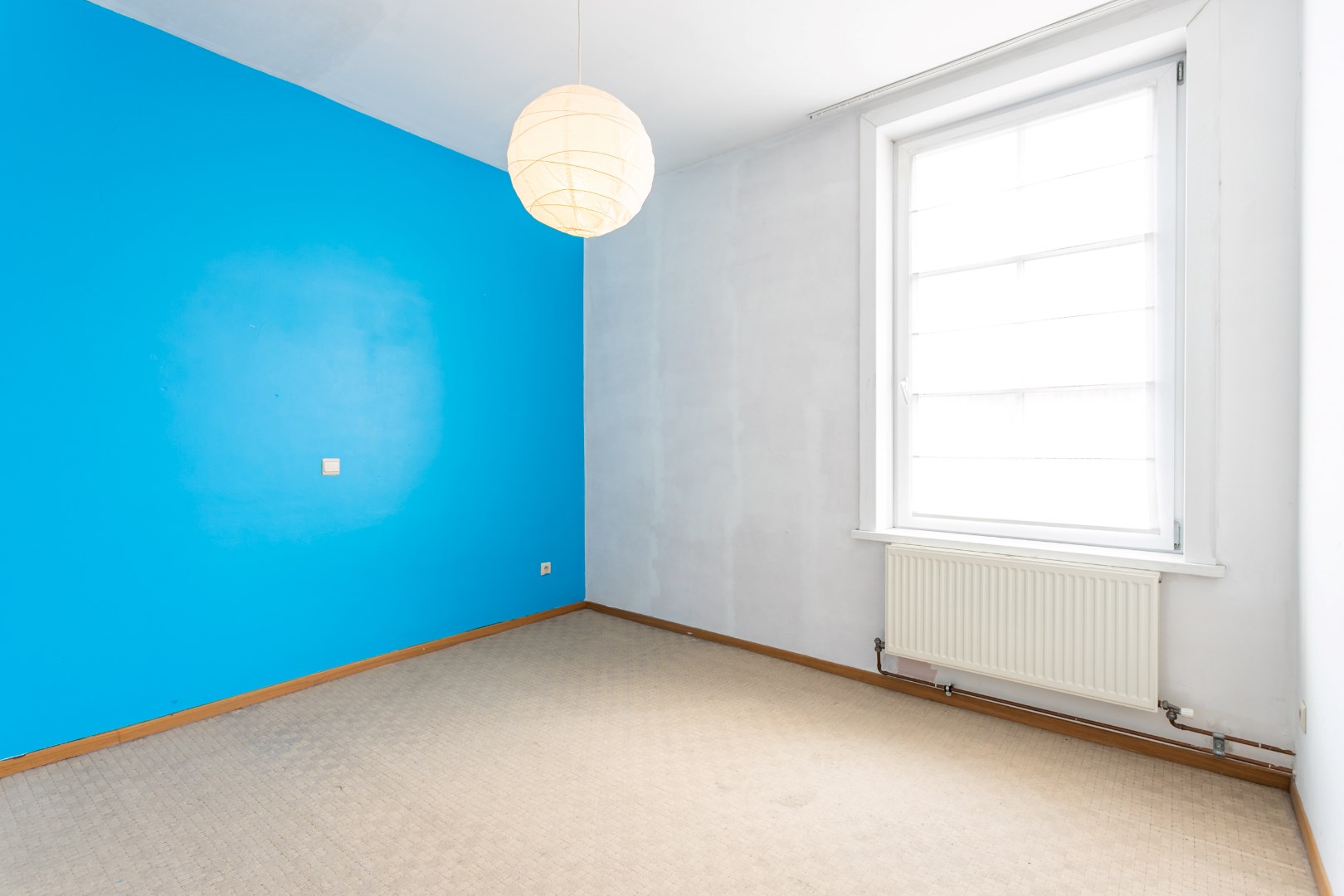 Instapklare woning met 3 slaapkamers, tuin en uitstekende ligging te Halle 