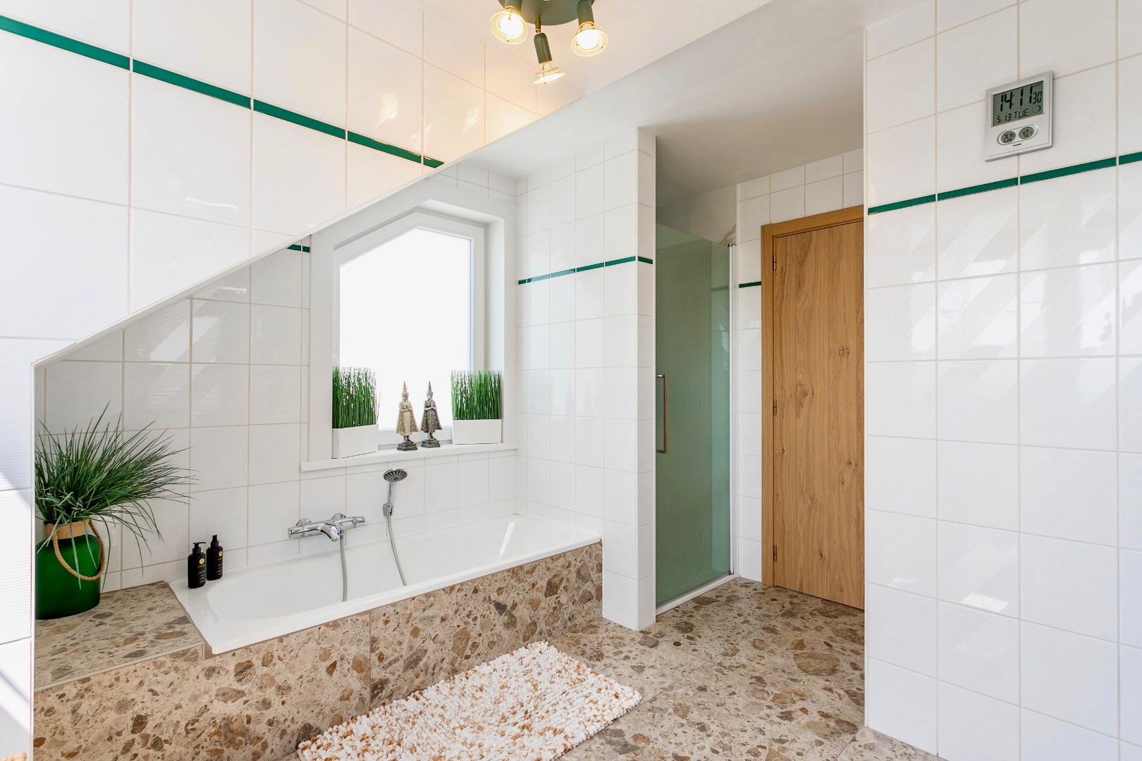 Rustig gelegen, energiezuinige woning op +/- 7a te Buizingen. 