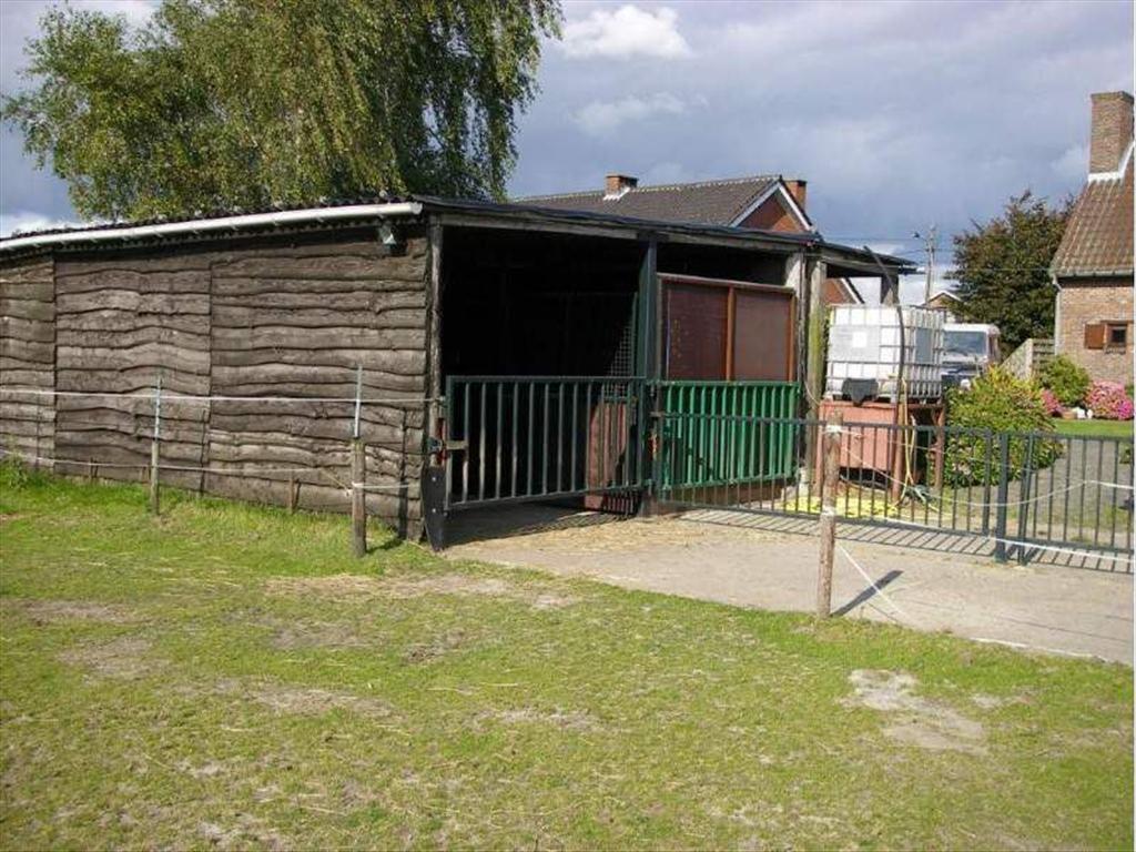 Gezellige gezinswoning met 3 paardenstallen te Meerdonk 